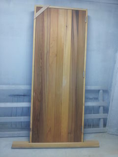 Tounge & Groove Door in a Macrocarpa frame